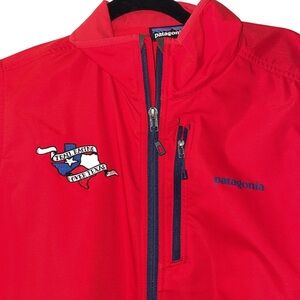 Patagonia Red Shell Jacket with blue trim size medium